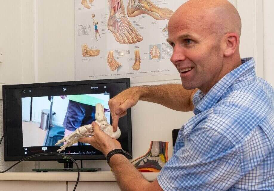 Podiatrist Andrew Jones explaining biomechanics